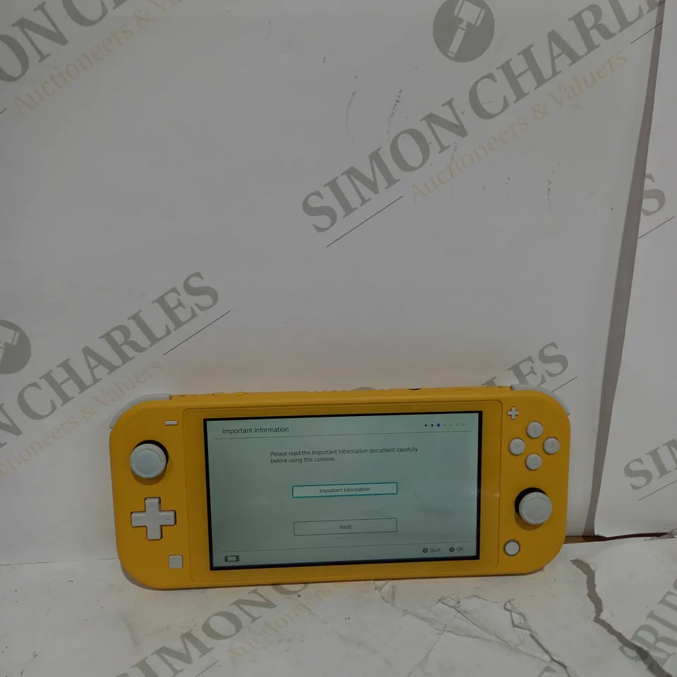UNBOXED NINTENDO SWITCH LITE IN YELLOW