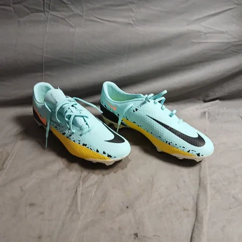 NIKE PHANTOM FOOTBALL BOOTS – TURQUOISE UPPER, BLACK SWOOSH, YELLOW OUTSOLES