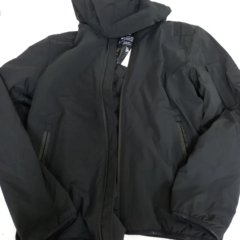 CALVIN KLEIN 4-WAY STRETCH HOODED JACKET IN BLACK - MEDIUM