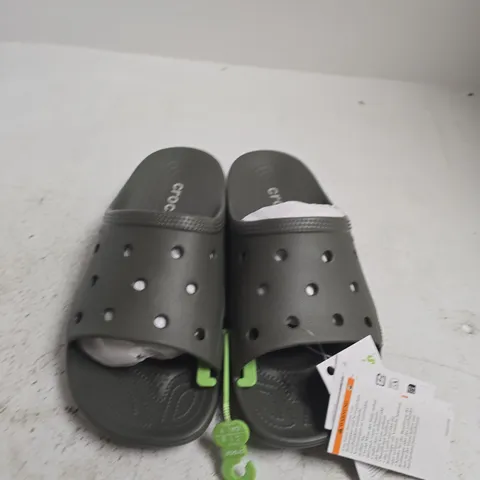 CROCS GREY SLIDES - SIZE 9