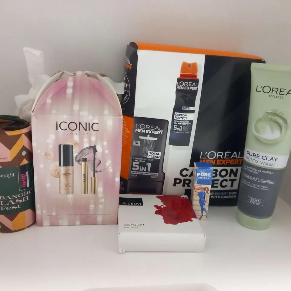 APPROXIMATELY SIX ASSORTED COSMETICS PRODUCTS TO INCLUDE; L'ORELA, BENEFIT, ICONIC AND BLUESKY