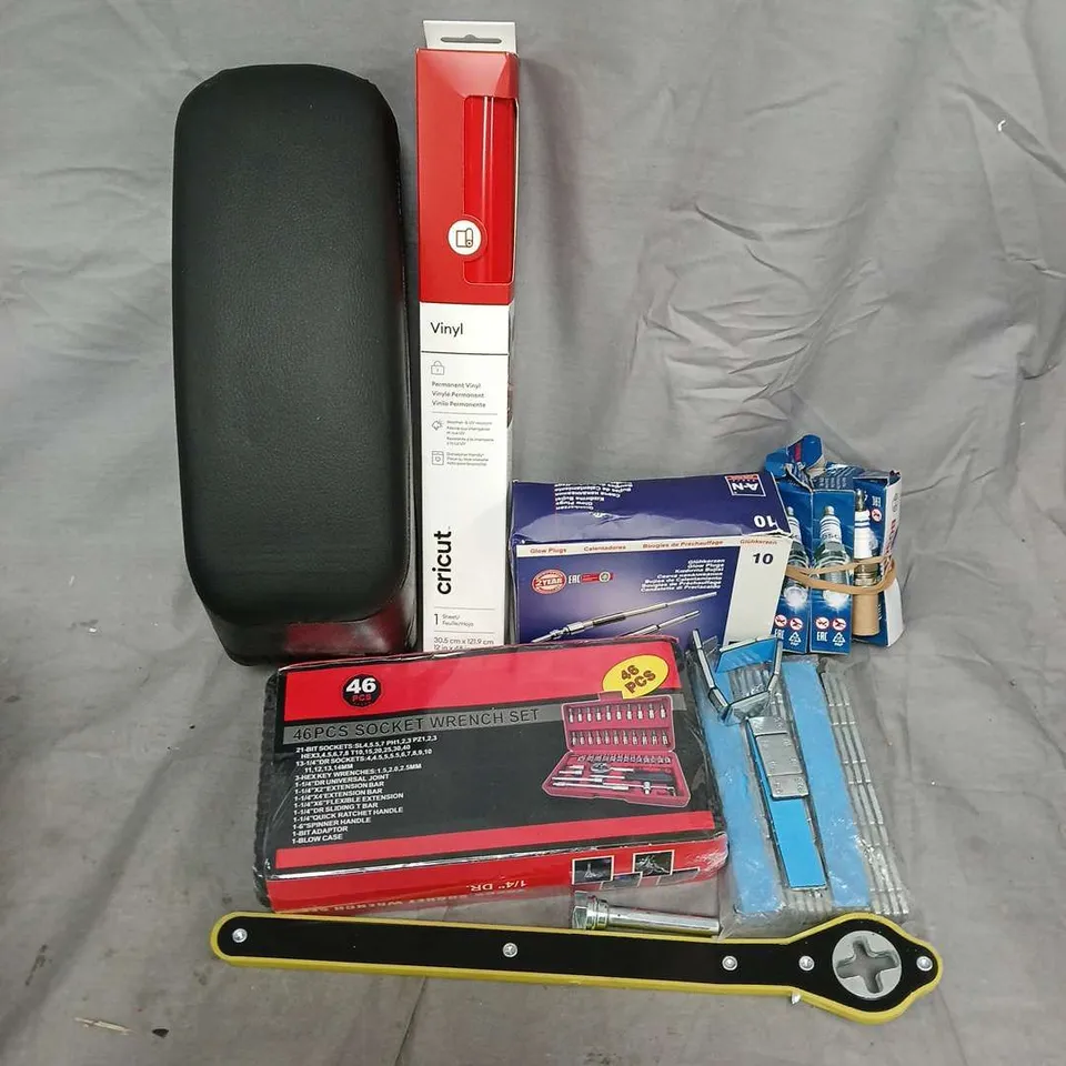 APPROXIMATELY 10 ASSORTED VEHICLE PARTS & ACCESORIES TO INCLUDE CRICUT VINYL, 46 PCS SOCKET WRENCH SET, BOSCH SPARK PLUG, ETC