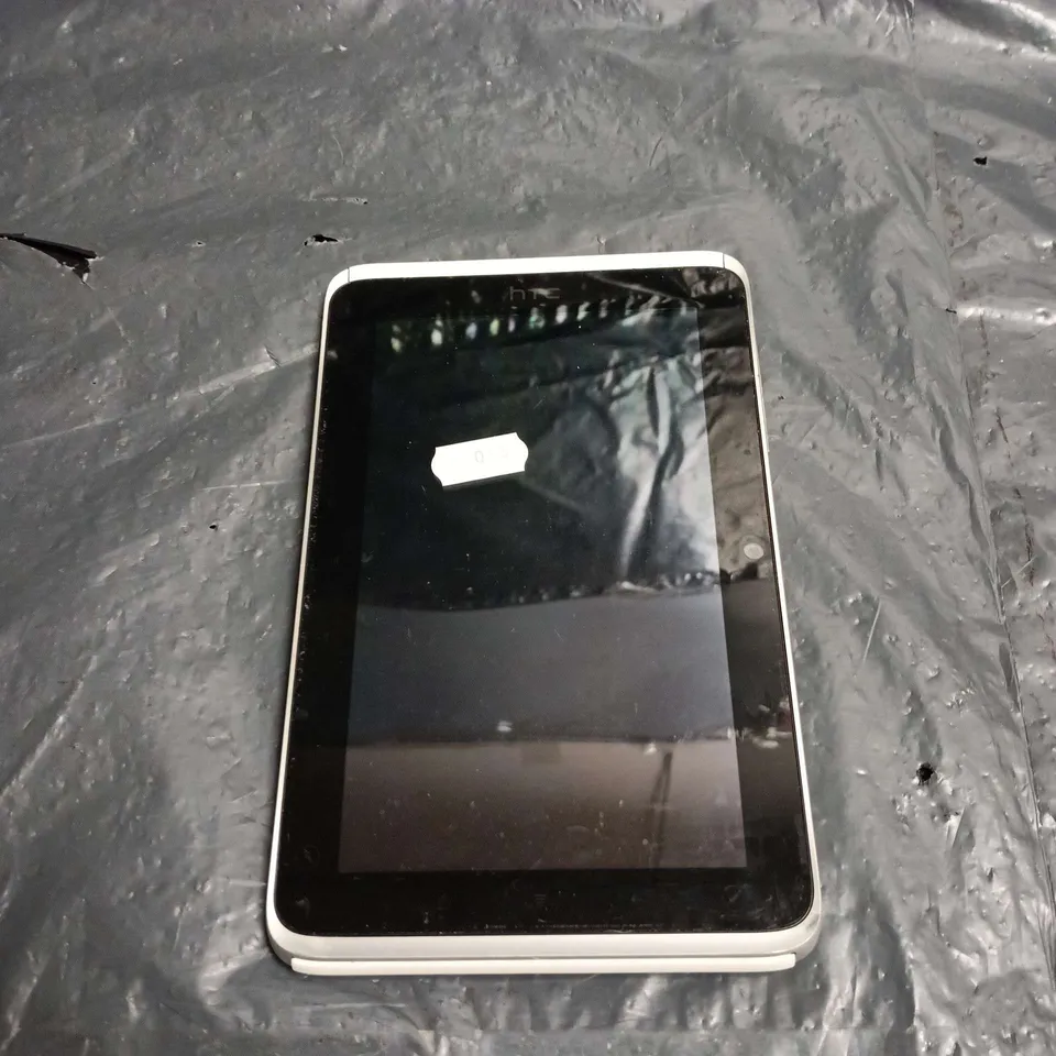 HTC TABLET DEVICE - SILVER BACK WITH 'WITH HTC SENSE' BRANDING