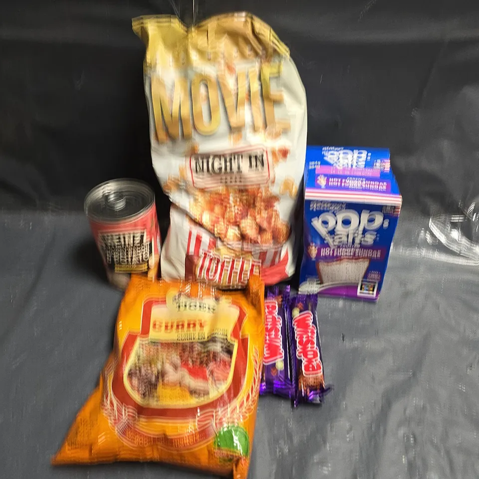 TOTE OF APPROZ 7 ASSORTED FOOD AND DRINK ITEMS TO INCLUDE – POPCORN, BISCUITS & CHOCOLATE BARS