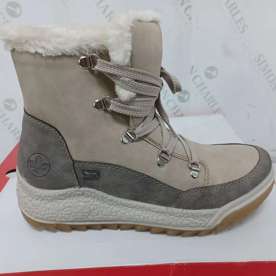 BOXED PAIR OF RIEKER ANTISTRESS WATER RESISTANT WARM HIKING BOOTS IN CREAM - SIZE 39