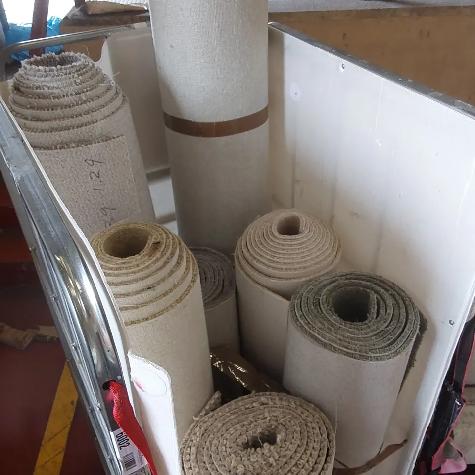 CAGE CONTAINING APPROXIMATELY 7 ASSORTED SMALL CARTPETS/CARPET CUT-OFFS // CAGE NOT INCLUDED 
