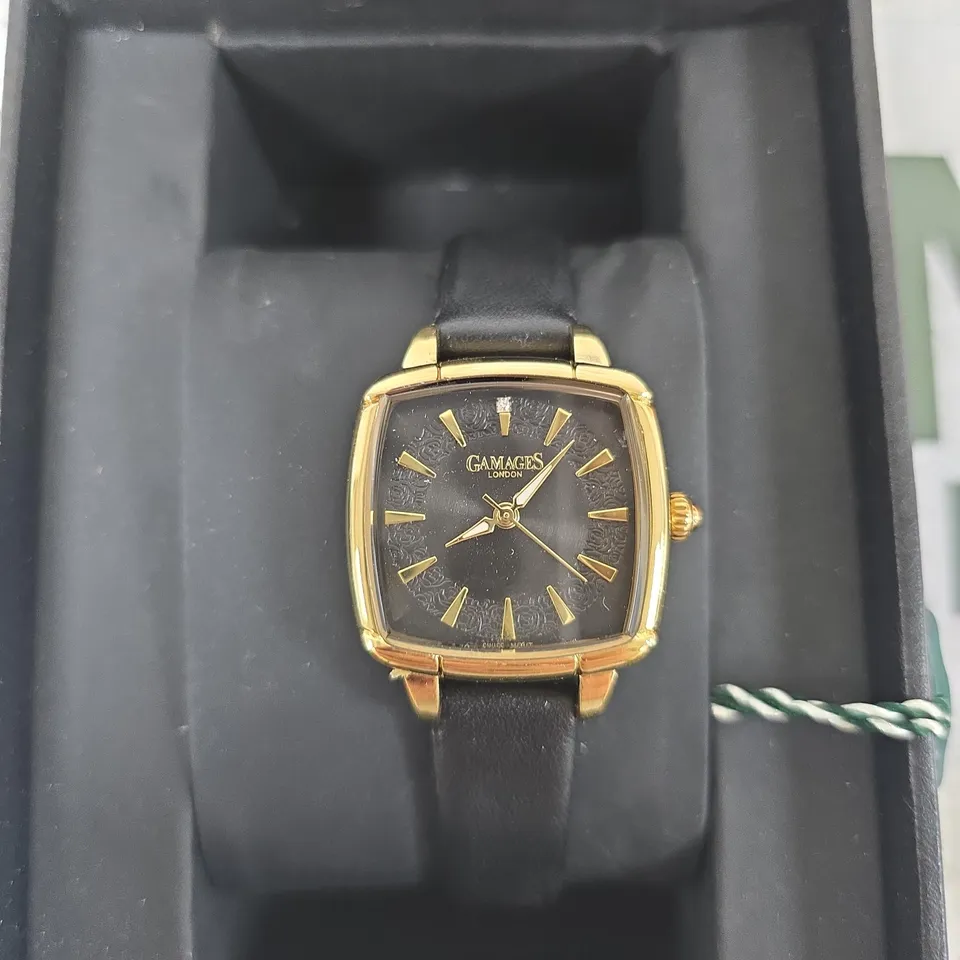 GAMAGES LONDON GOLD-TONE WRISTWATCH WITH BLACK DIAL AND LEATHER STRAP