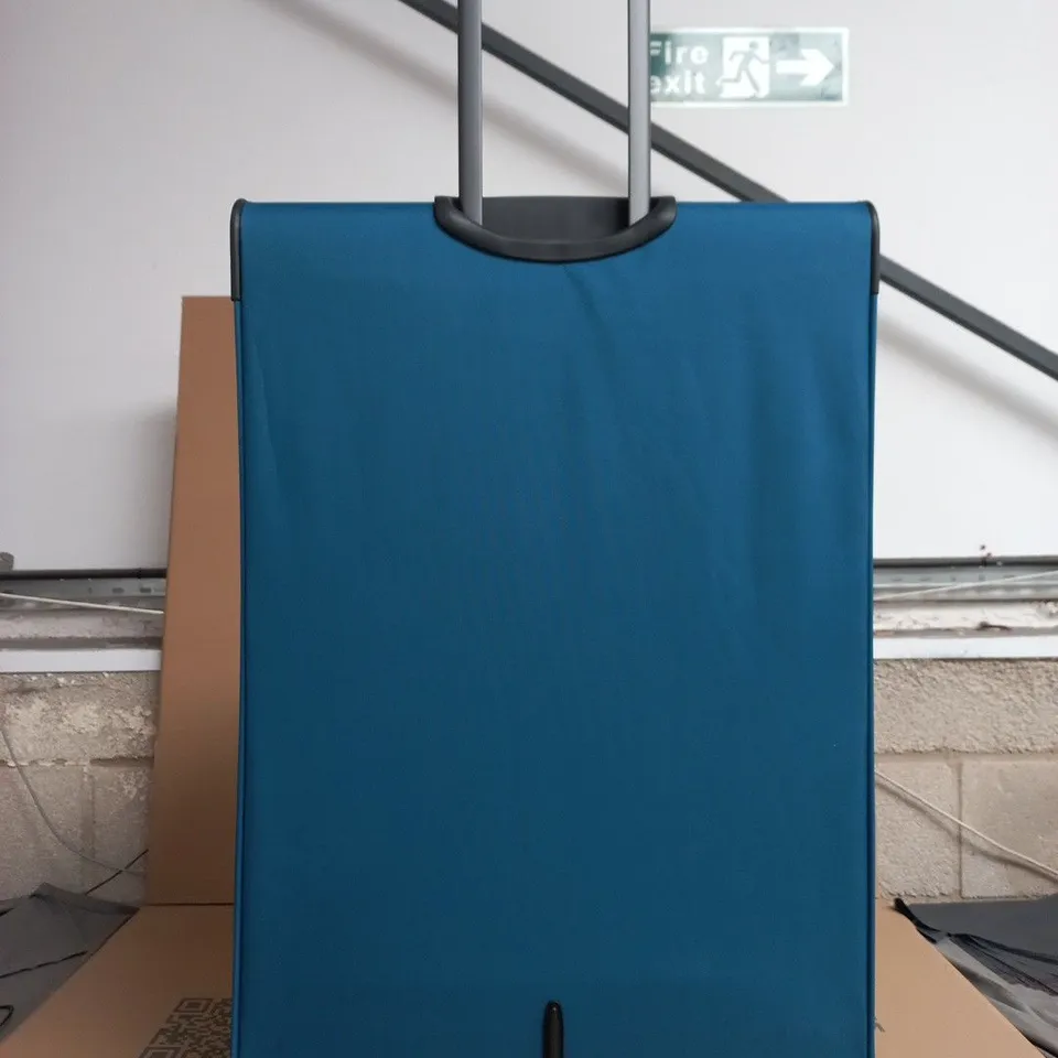 TRIPP EXPANDABLE BLUE WHEELED SUITCASE