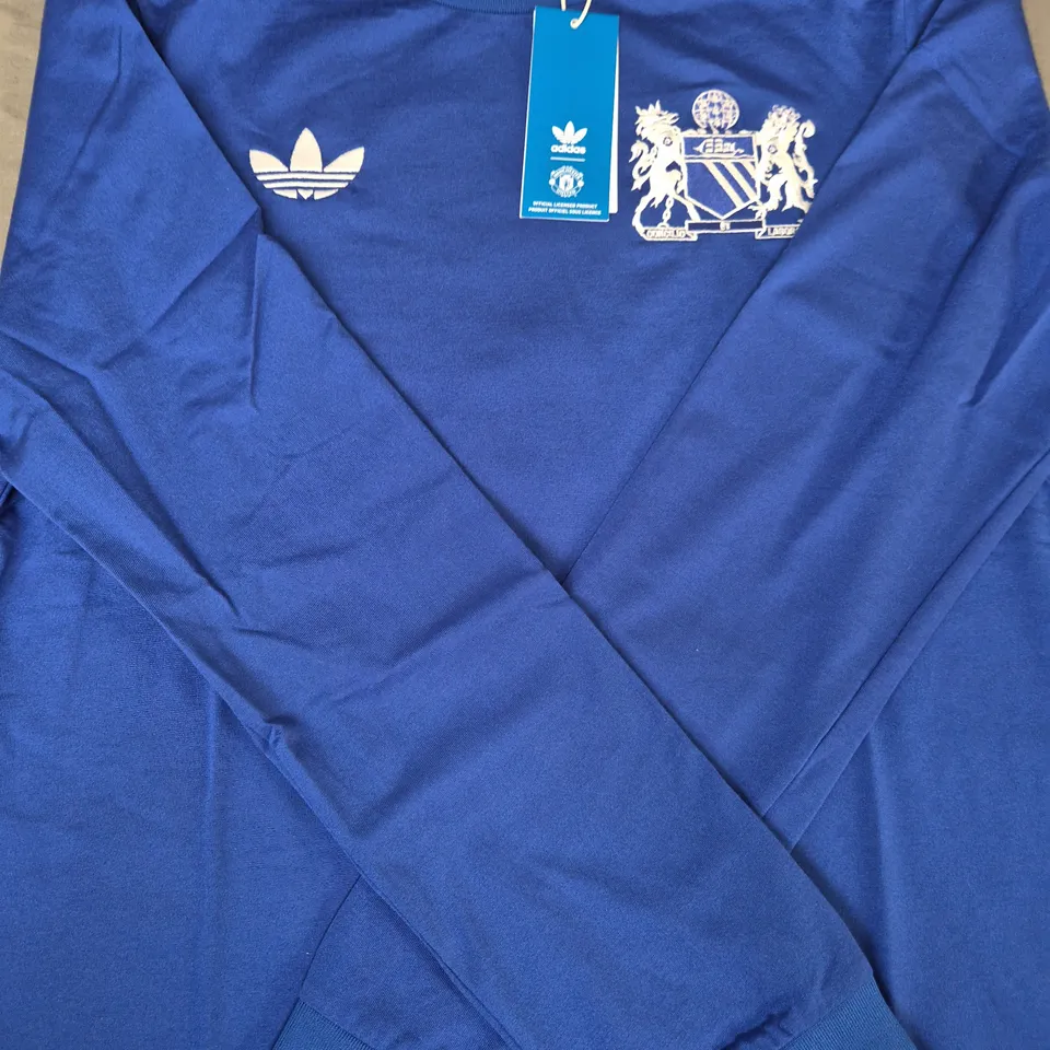 ADIDAS MANCHESTER UNITED LONG SLEEVE GEORGE BEST TOP IN BLUE SIZE SMALL