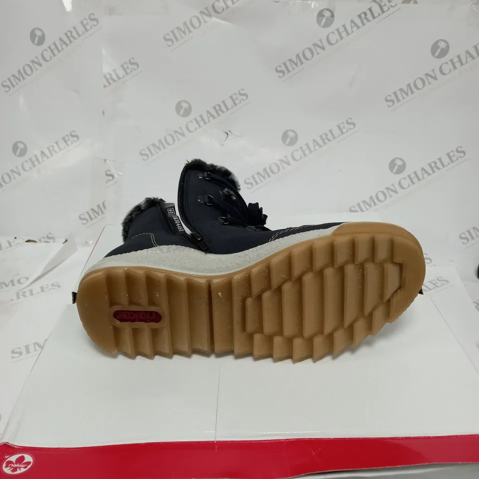 BOXED PAIR OF RIEKER BOOTS SIZE 6 AND A HALF
