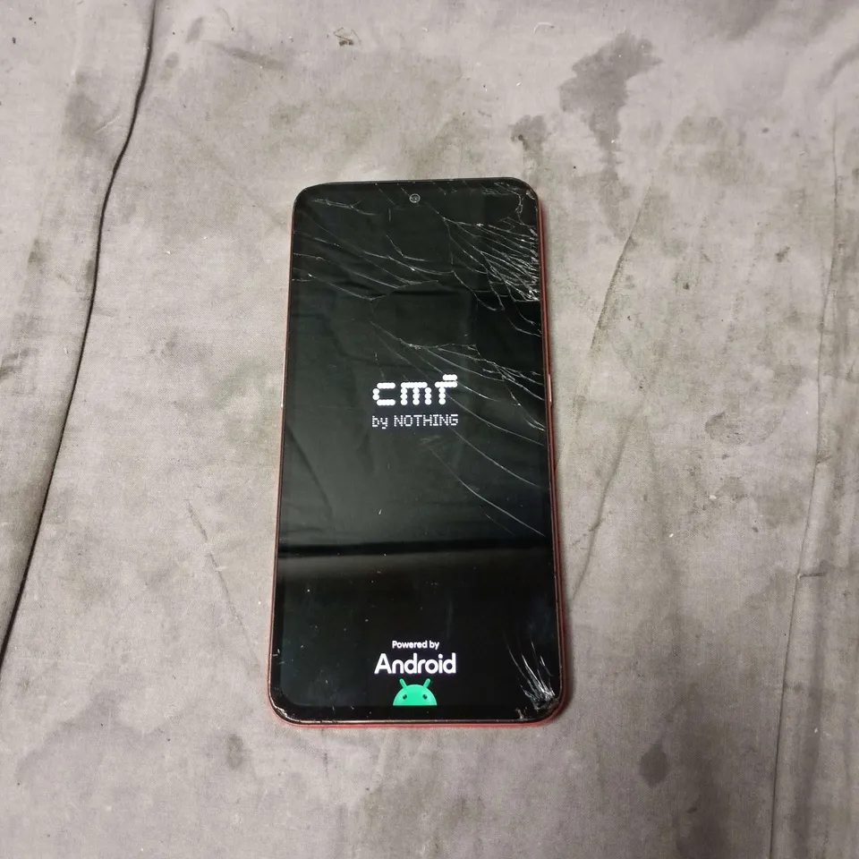 CMF BY NOTHING ANDROID PHONE. ORANGE BACK. SCREEN CRACKED