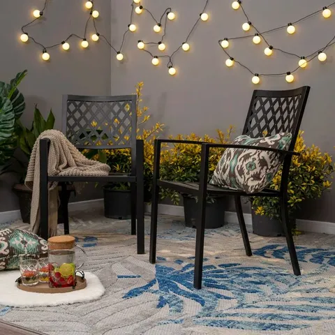 BOXED CAREEN STACKING PATIO DINING ARMCHAIR