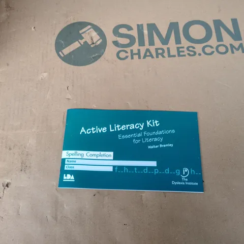 BOX OF APPROXIMATELY 170 BRAND NEW ACTIVE LITERACY KITS (SPELLING COMPLETION)