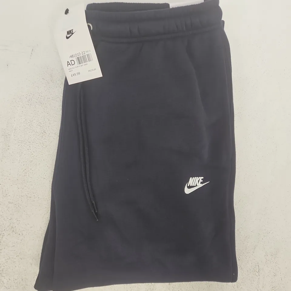NIKE STANDARD FIT TAPER LEG SWEATPANTS IN NAVY SIZE MEDIUM