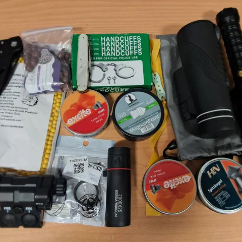LOT OF APPROXIMATELY 14 ASSORTED SPORTING ITEMS TO INCLUDENAIREOFT PELLETS, MONOCULAR AND HANDCUFFS 