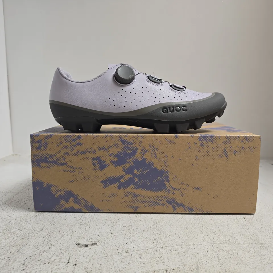 BOXED PAIR OF QUOC GRAN TOURER III TRAINERS IN LILAC HAZE SIZE EU 42