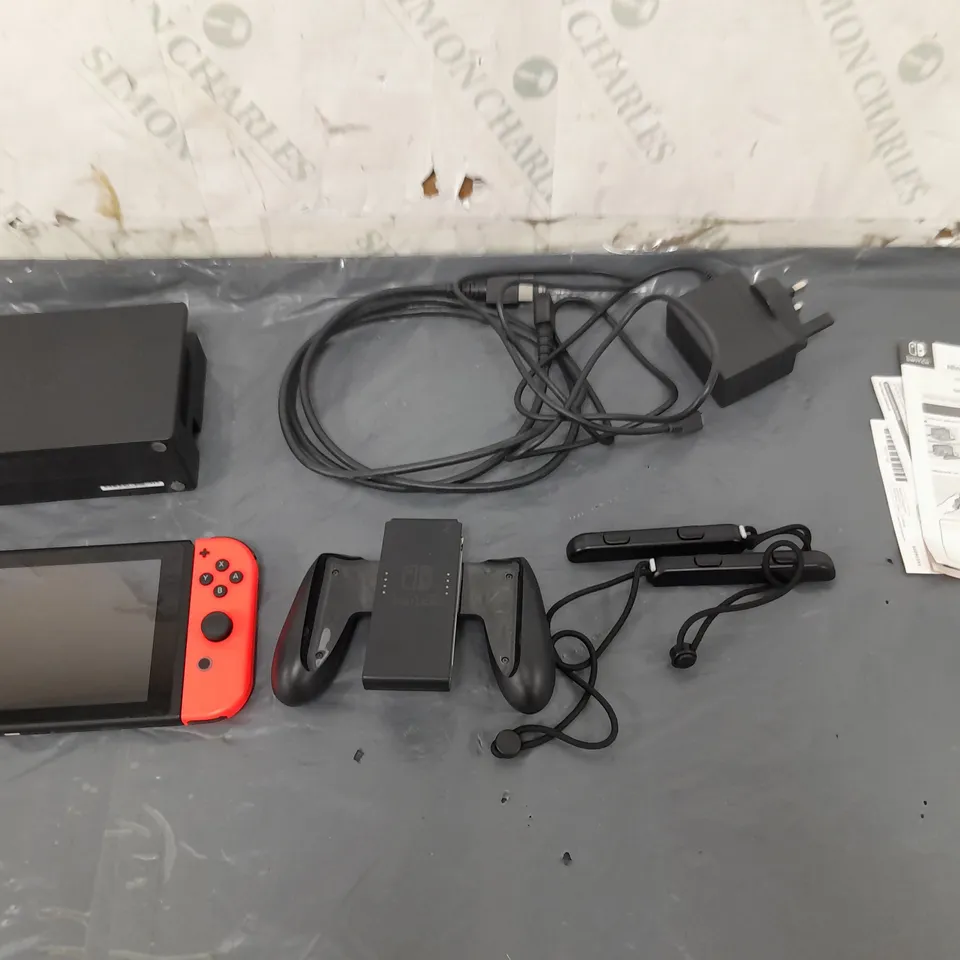 UNBOXED NINTENDO SWITCH WITH ACCESSORIES AND WIRES 
