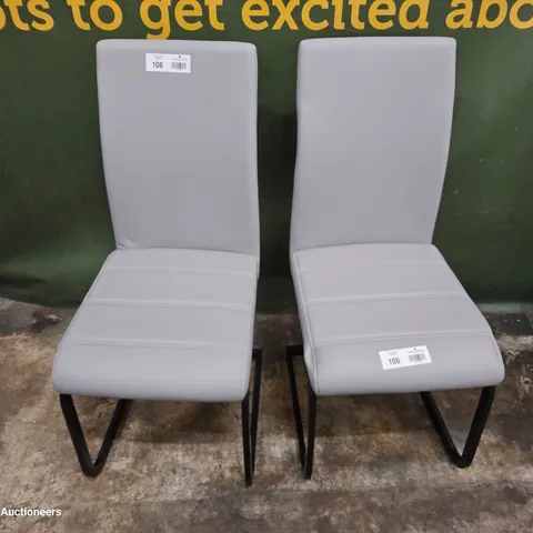 PAIR OF BLACK METAL FRAMED GREY PU UPHOLSTERED DINING CHAIRS