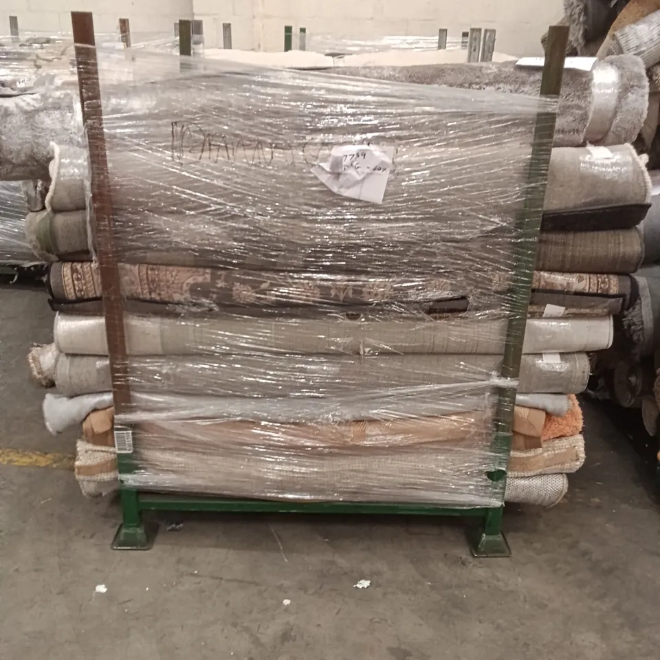 STILLAGE OF ASSORTED QUALITY RUGS APPROXIMATELY 32