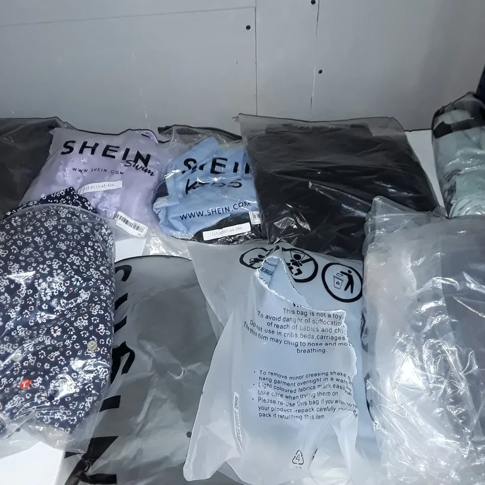 MEDIUM BOX OF 10 ASSORTED CLOTHING ITEMS TO INCLUDE A FLOWERY PATTERNED DRESS AND A PAIR OF DEMIN JEANS