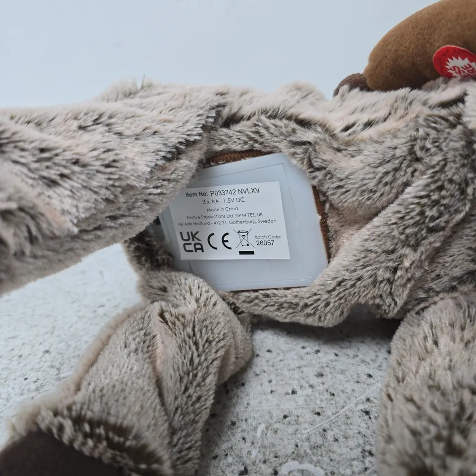 FESTIVE ANIMATED REINDEER PLUSH – BATTERY OPERATED