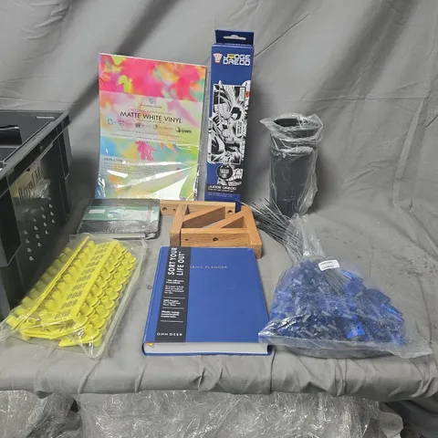 APPROXIMATELY 15 ASSORTED CRAFTS, MATTE WHITE VINYL SHEETS, JUDGE DREDD ITEM, PLANNER AND YELLOW HANDHELD TOOL