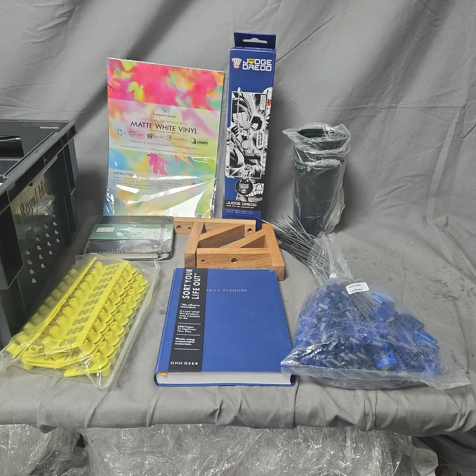 APPROXIMATELY 15 ASSORTED CRAFTS, MATTE WHITE VINYL SHEETS, JUDGE DREDD ITEM, PLANNER AND YELLOW HANDHELD TOOL