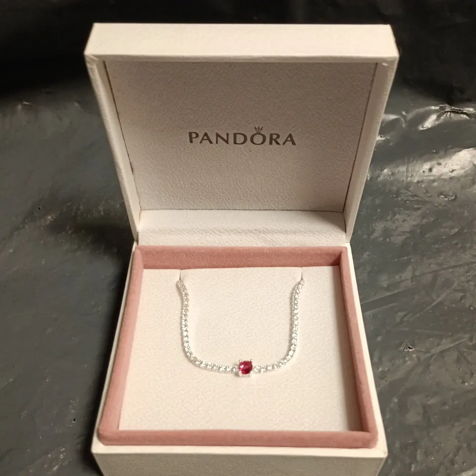 PANDORA SILVER-TONE BRACELET WITH RED GARNET CENTRE STONE AND PAVÉ CRYSTALS – BOXED