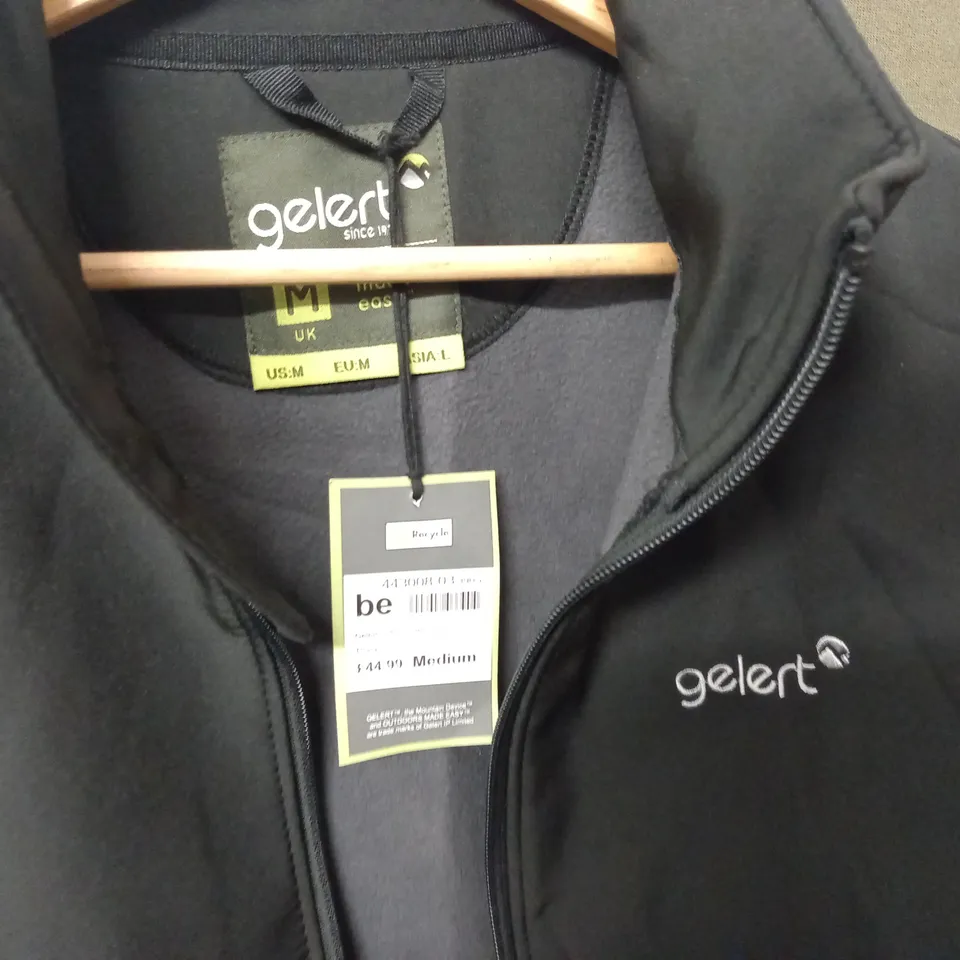 GELERT SOFTSHELL JACKET IN BLACK - MED