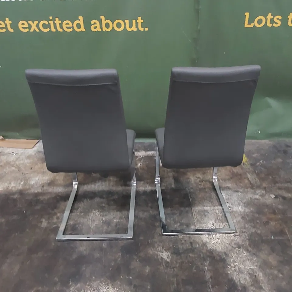 SET OF DESIGNER DINING CHAIRS IN PU LEATHER WITH CHROME LEGS 