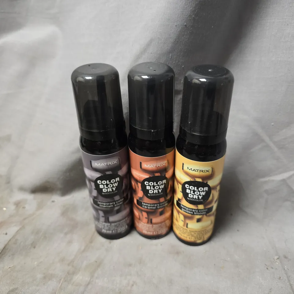APPROXIMATELY 20 ASSORTED MATRIX BLOW DRY SPRAYS TO INCLUDE CARAMEL BLONDE, TITANIUM SILVER, GOLDEN BLONDE, ETC - COLLECTION ONLY