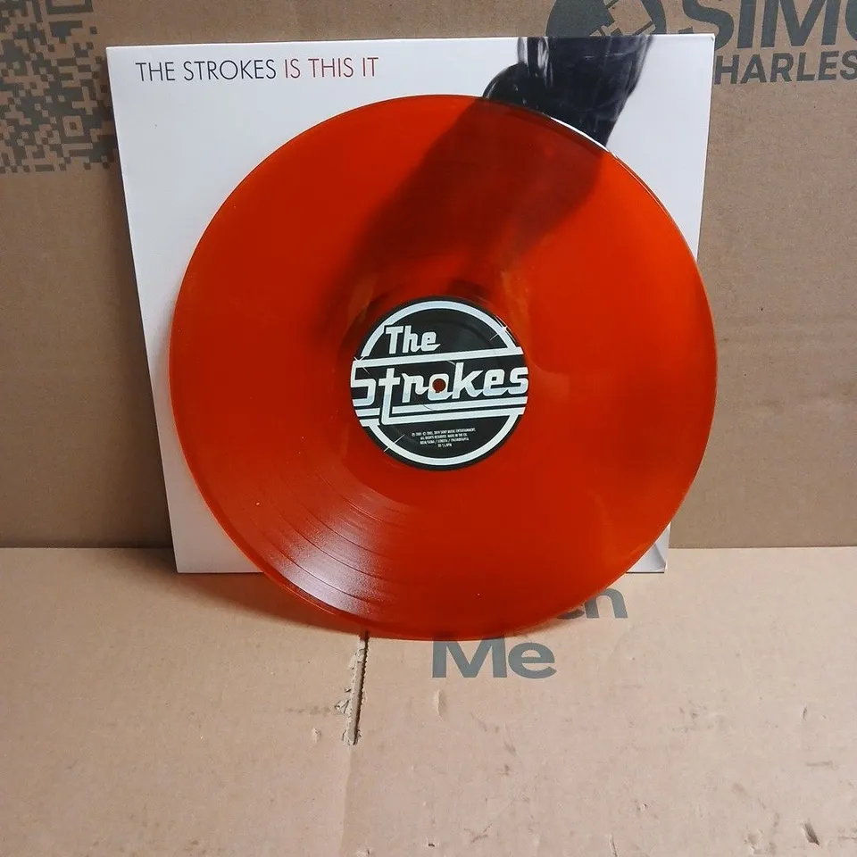 THE STROKES IS THIS IT RED VINYL LP