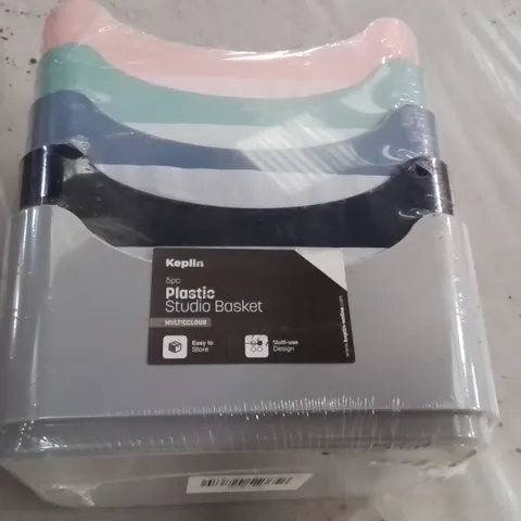 APPROXIMATELY NINE SETS OF FIVE PLASTIC STUDIO BASKETS