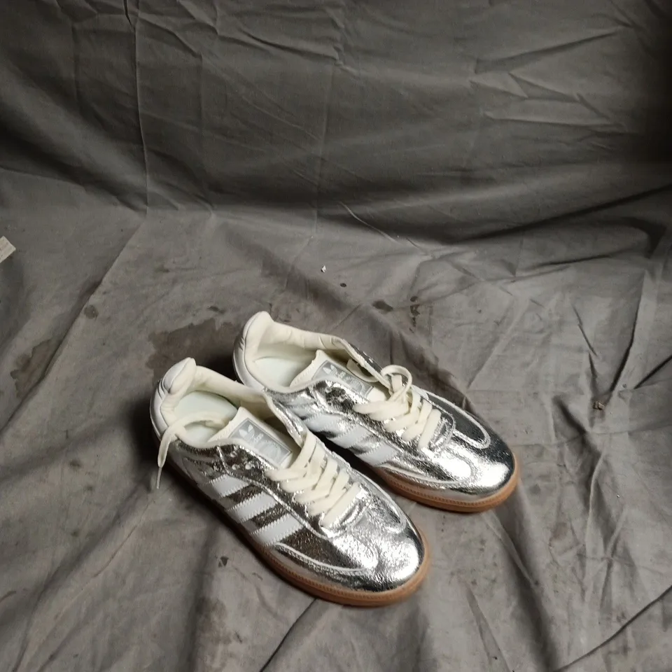 BOX OF APPROXIMATELY 20 PAIRS OF SHOES TO INCLUDE: SILVER ADIDAS TRAINERS AND BLACK BOOTS