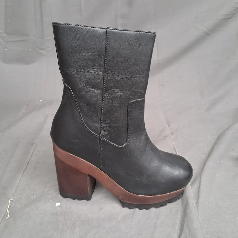 BOX OF APPROXIMATLY 6 WOODEN BOTTOM LEATHER BOOT VARIOUS SIZES 