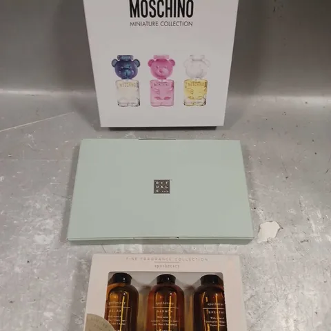 LOT OF 3 ASSORTED COSMETIC BOXSETS TO INCLUDE - RITUALS HAND CARE KIT - MOSCHINO MINIATURE FRAGRANCE COLLECTION - APOTHECARY FINE FRAGRANCE COLLECTION