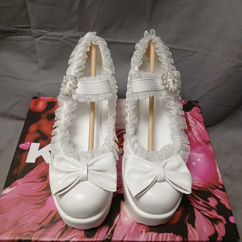 KOI WHITE TIRA RUFFLE MARY JANES – PORCELAIN DELIGHT EDITION UK 6