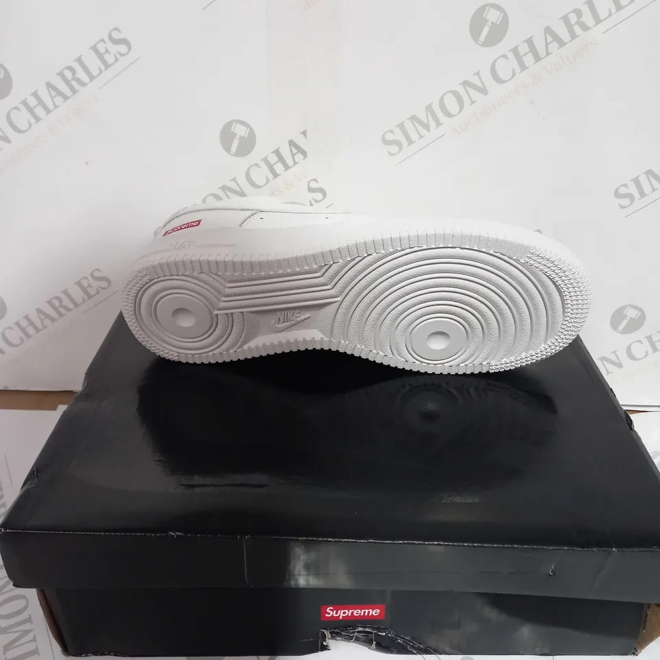 BOXED PAIR OF SUPREME/NIKE WHITE AIR FORCE ONES SIZE 6