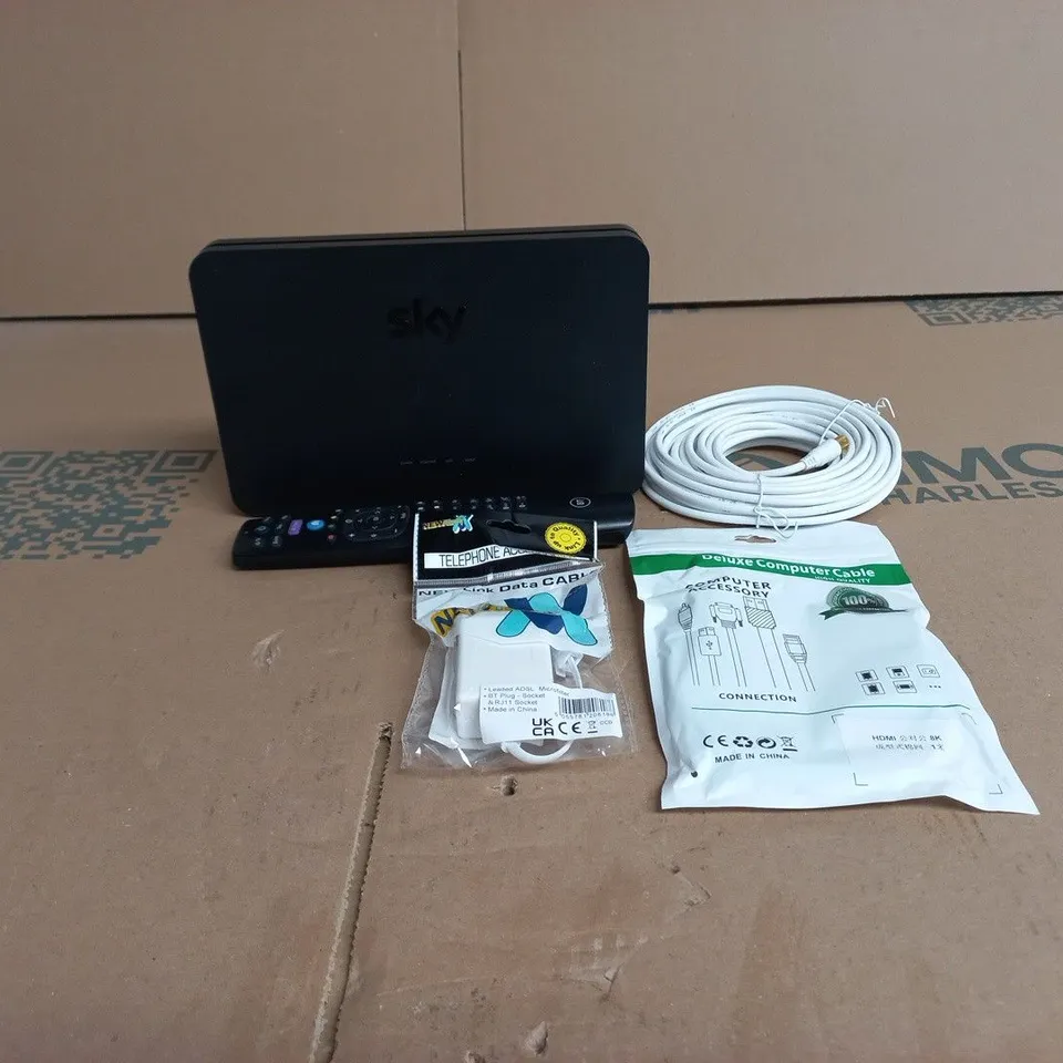 TOTE OF APPROXIMATELY 15 ASSORTED ITEMS TO INCLUDE SKY HUB, CABLES, REMOTE CONTROL ETC