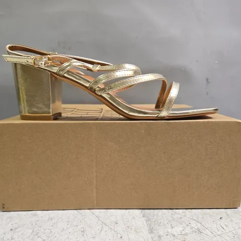 BOXED PAIR OF WHERE'S THAT FROM OPEN TOE BLOCK HEEL SANDALS IN METALLIC GOLD SIZE UK 7