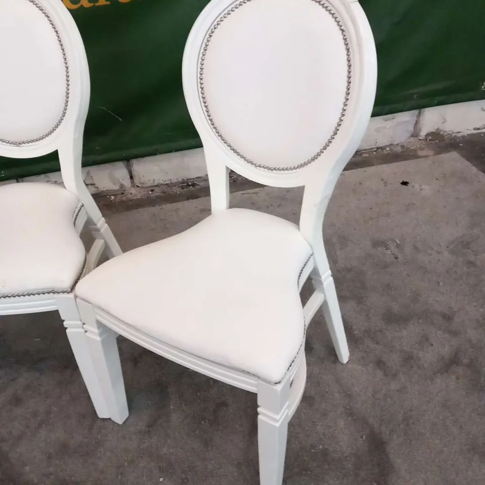 FOUR DESIGNER WHITE ISLA STYLE BANQUET CHAIRS