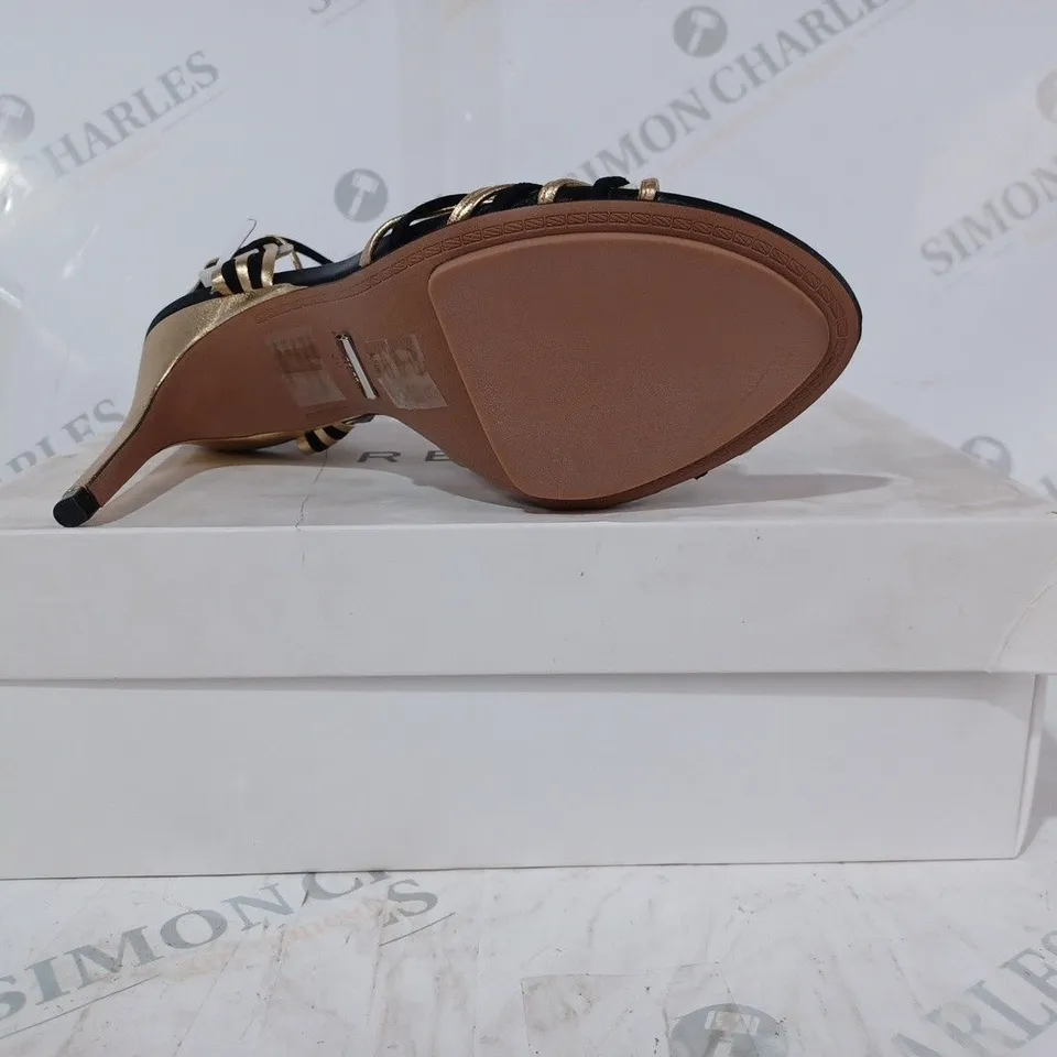 BOXED PAIR OF REISS CASSIDY STRAPPY HEELS IN BLACK/GOLD SIZE 5