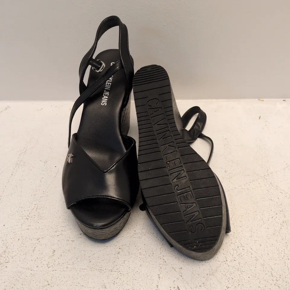 CALVIN KLEIN JEANS BLACK WEDGE SANDALS – ANKLE STRAP