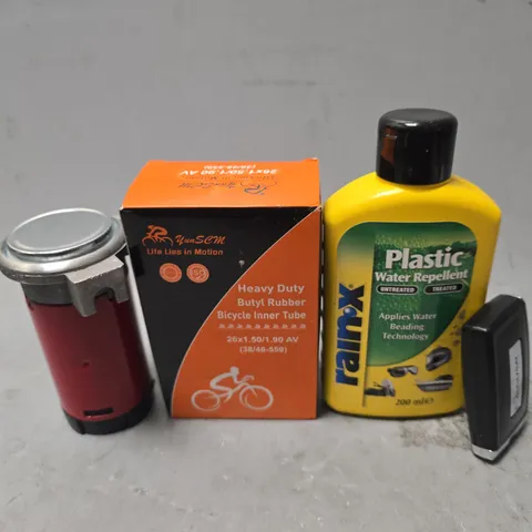 APPROXIMATELY 10 ASSORTED ITEMS TO INCLUDE - PLASTIC WATER REPELLENT , JAGUAR CAR KEY , HEAVY DUTY BICYCLE INNER TUBE ETC