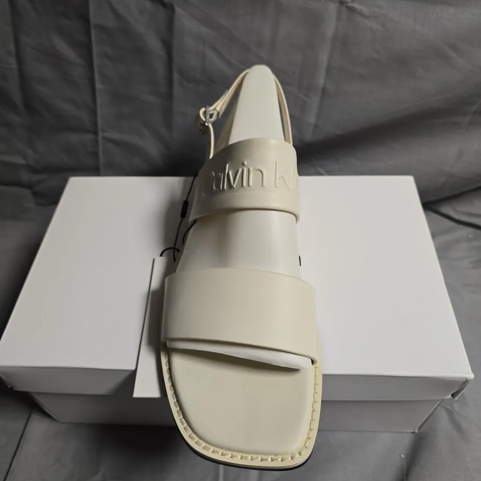 BOXED PAIR OF CALVIN KLEIN FLAT SANDALS - UK SIZE 38
