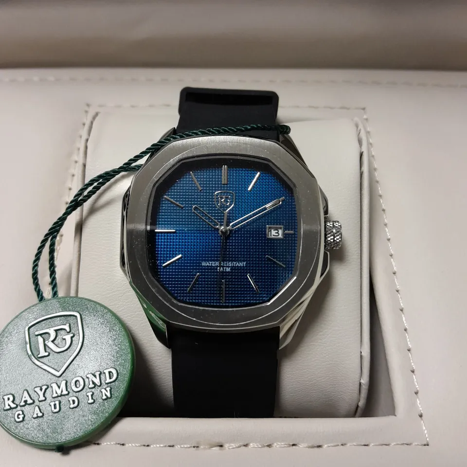 MENS RAYMOND GAUDIN BLUE DIAL WATCH WITH STAINLESS STEEL CASE AND RUBBER STRAP, WATER RESISTANT WITH JPN MOVEMENT IN WOODEN GIFT BOX