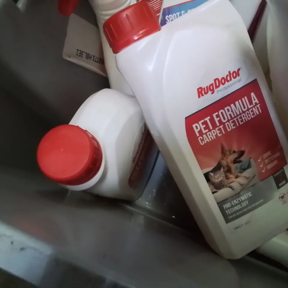 TRAY OF ASSORTED RUG DOCTOR SPRAY TREATMENTS & DETERGENT 