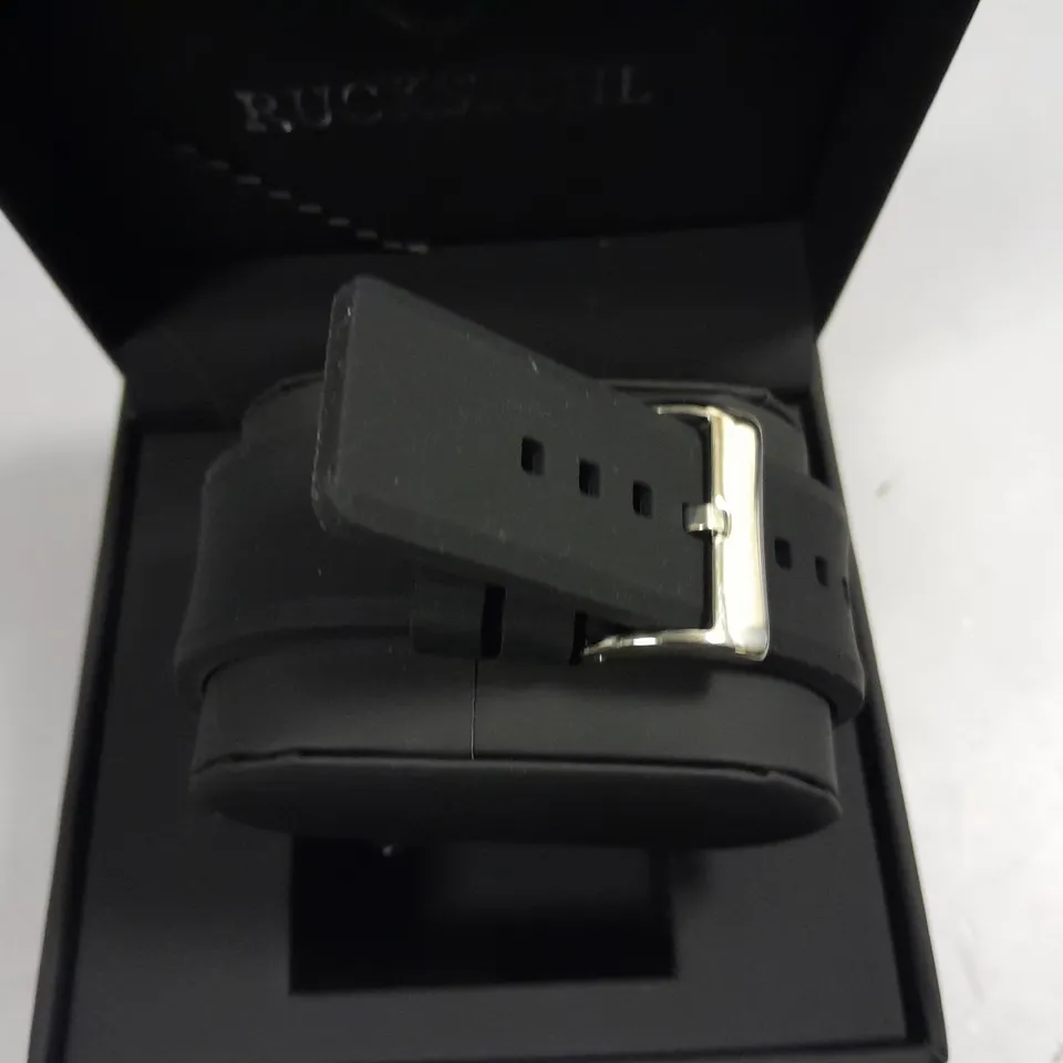MENS RUCKSTUHL BLACK DIAL WATER RESISTANT WATCH WITH STAINLESS STEEL CASE AND RUBBER STRAP IN GIFT BOX