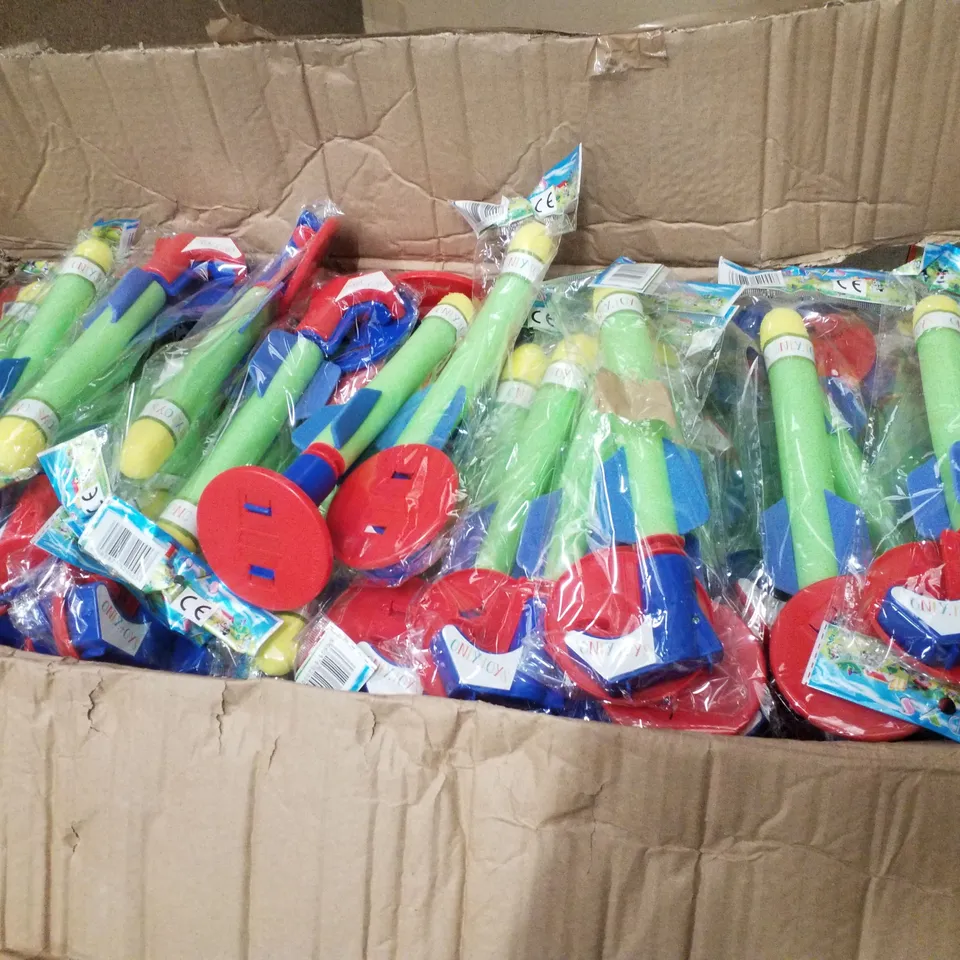 BOX CONTAINING APPROXIMATELY 180 SPRING LAUNCH ROCKET TOYS