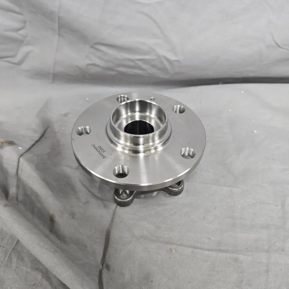 Machined metal hub flange with five bolt holes – automotive part